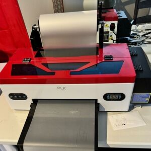 PLK 1800 DTF direct to film printer . Printer oven and heat press .